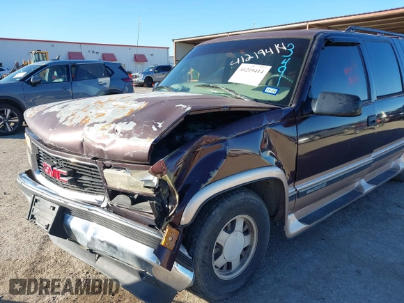1997 GMC Suburban z VIN 1GKEC16RXVJ703491, wystawiony jako IAAI lot #41219414 z przebiegiem 362 551 mil mil oraz . Historia ofert i sprzedaży dostępna na DreamBid. Obrazek 6.