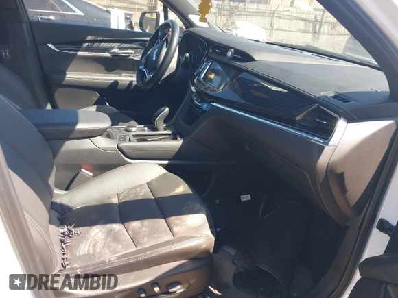 2023 Cadillac XT6 AWD Premium Luxury z VIN 1GYKPDRS4PZ182799, wystawiony jako IAAI lot #42161097 z przebiegiem 22 776 mil mil oraz . Historia ofert i sprzedaży dostępna na DreamBid. Obrazek 5.