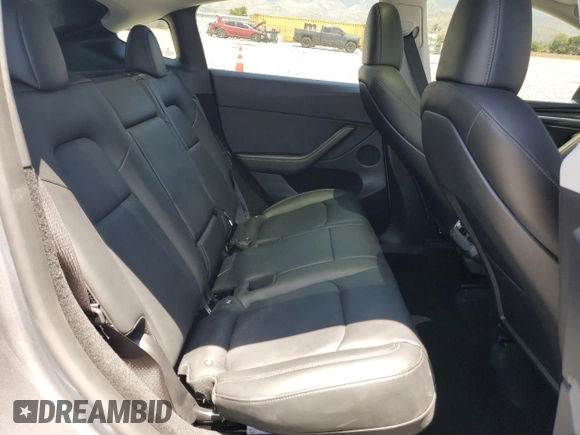 2024 Tesla Model Y Long Range with VIN 7SAYGDEE0RA288420, listed as a Copart auction lot 59159015 with 7,831 mi miles and Salvage title. Bid and sale history available at DreamBid. Image 10.