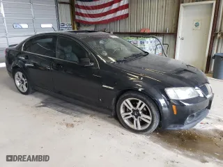 2009 Pontiac G8 with VIN 6G2ER57749L228811, listed as a Copart auction lot 59982614 with 184,222 mi miles and Salvage Title. Bid and sale history available at carsss.com. Image 4.