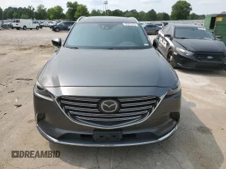 2017 Mazda CX-9 Grand Touring z VIN JM3TCADYXH0138805, wystawiony jako Copart lot #59201915 z przebiegiem 147 896 mil mil oraz Czysty tytuł • Clean title. Historia ofert i sprzedaży dostępna na DreamBid. Obrazek 5.