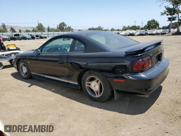 1997 Ford Mustang with VIN 1FALP4048VF172130, listed as a Copart auction lot 59790275 with 125,336 mi miles and Salvage title. Bid and sale history available at DreamBid. Image 2.