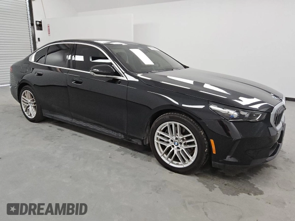 2024 BMW 5 Series 530i xDrive with VIN WBA53FJ03RCP96427, listed as a Copart auction lot 52829235 with 14,017 mi miles and Clean Title. Bid and sale history available at carsss.com. Image 4.