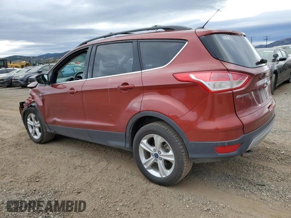2015 Ford Escape SE with VIN 1FMCU9GX6FUC67715, listed as a Copart auction lot 73495244 with 184,183 mi miles and Salvage Title. Bid and sale history available at DreamBid. Image 2.