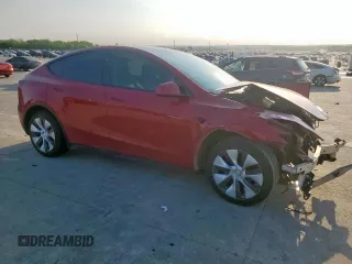 2023 Tesla Model Y Long Range z VIN 7SAYGDEE8PA138780, wystawiony jako Copart lot #53294385 z przebiegiem 137 496 mil mil oraz Szkoda całkowita • Salvage title. Historia ofert i sprzedaży dostępna na DreamBid. Obrazek 4.
