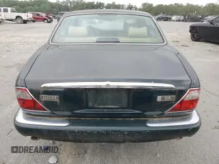 1999 Jaguar XJ with VIN SAJHX1044XC865054, listed as a Copart auction lot 57825325 with 71,145 mi miles and Clean title. Bid and sale history available at DreamBid. Image 6.