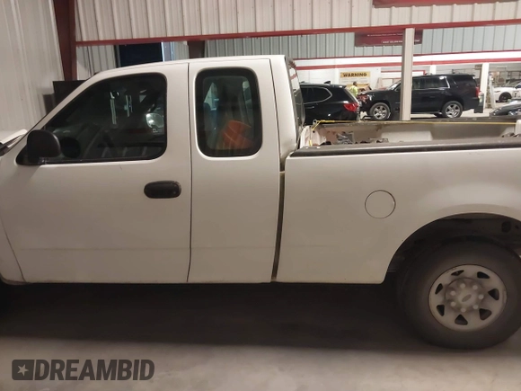 2001 Ford F-150 XL with VIN 1FTPX17L31NB27121, listed as a IAAI auction lot 41169060 with 247,389 mi miles and . Bid and sale history available at DreamBid. Image 14.
