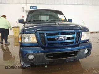 2011 Ford Ranger XLT with VIN 1FTLR4FE3BPA52049, listed as a IAAI auction lot 41394422 with 112,080 mi miles. Bid and sale history available at carsss.com. Image 12.
