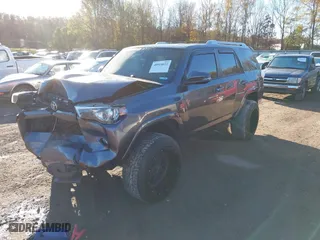 2015 Toyota 4Runner Limited with VIN JTEBU5JRXF5204738, listed as a IAAI auction lot 40918022 with 228,213 mi miles. Bid and sale history available at carsss.com. Image 17.