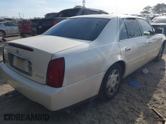 2002 Cadillac DeVille z VIN 1G6KD54Y72U218221, wystawiony jako IAAI lot #41842554 z przebiegiem 117 430 mil mil oraz . Historia ofert i sprzedaży dostępna na DreamBid. Obrazek 4.