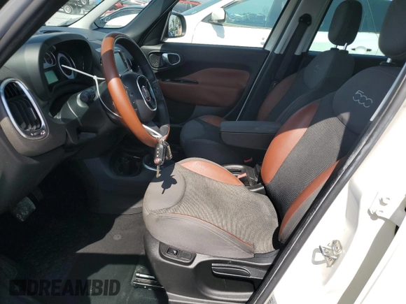 2014 FIAT 500L Trekking with VIN ZFBCFADH9EZ015734, listed as a Copart auction lot 57647185 with 67,302 mi miles and Salvage title. Bid and sale history available at DreamBid. Image 7.