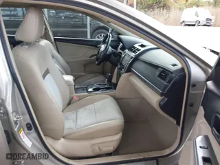 2014 Toyota Camry Hybrid LE with VIN 4T1BD1FK4EU106488, listed as a IAAI auction lot 40794286 with 98,911 mi miles. Bid and sale history available at carsss.com. Image 5.