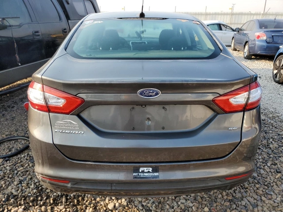2016 Ford Fusion SE z VIN 3FA6P0H78GR203242, wystawiony jako Copart lot #65384304 z przebiegiem 163 654 mil mil oraz Szkoda całkowita • Salvage title. Historia ofert i sprzedaży dostępna na DreamBid. Obrazek 6.