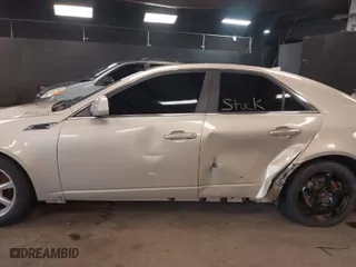 2009 Cadillac CTS AWD w/1SA with VIN 1G6DG577590157729, listed as a IAAI auction lot 41878455 with 169,139 mi miles. Bid and sale history available at carsss.com. Image 15.