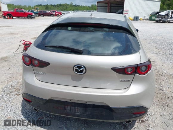 2022 Mazda Mazda3 Hatchback Premium with VIN JM1BPAML5N1507556, listed as a IAAI auction lot 42087802 with 56,507 mi miles. Bid and sale history available at carsss.com. Image 16.