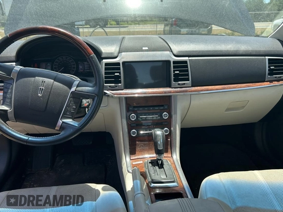 2011 Lincoln MKZ Hybrid with VIN 3LNDL2L33BR759329, listed as a Copart auction lot 55528975 with 131,927 mi miles and Clean Title. Bid and sale history available at carsss.com. Image 9.