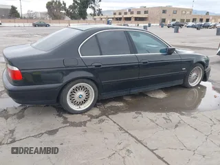 2001 BMW 5 Series 525iA with VIN WBADT43451GX20026, listed as a IAAI auction lot 41490075 with 141,700 mi miles. Bid and sale history available at carsss.com. Image 4.