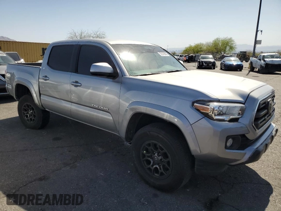 2018 Toyota Tacoma SR5 z VIN 3TMAZ5CN8JM077857, wystawiony jako Copart lot #52570945 z przebiegiem 50 182 mil mil oraz Szkoda całkowita • Salvage title. Historia ofert i sprzedaży dostępna na DreamBid. Obrazek 4.