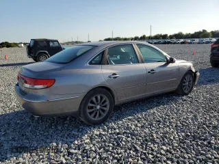 2007 Hyundai Azera SE z VIN KMHFC46F87A164195, wystawiony jako Copart lot #52500115 z przebiegiem 191 835 mil mil oraz Szkoda całkowita • Salvage title. Historia ofert i sprzedaży dostępna na DreamBid. Obrazek 3.