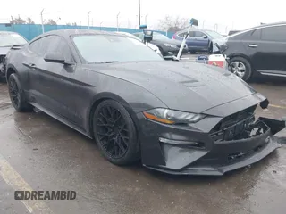2023 Ford Mustang EcoBoost with VIN 1FA6P8TH8P5111792, listed as a IAAI auction lot 41565345 with 42,906 mi miles. Bid and sale history available at carsss.com. Image 1.