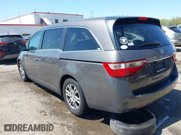 2012 Honda Odyssey EX-L with VIN 5FNRL5H68CB006686, listed as a IAAI auction lot 42039035 with 338,331 mi miles and . Bid and sale history available at carsss.com. Image 3.