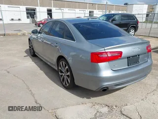 2013 Audi A6 3.0T Prestige with VIN WAUHGAFC4DN126258, listed as a IAAI auction lot 41512291 with 123,298 mi miles. Bid and sale history available at carsss.com. Image 3.