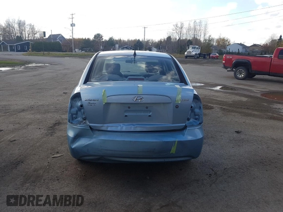 2007 Hyundai Accent GL z VIN KMHCN45C97U146808, wystawiony jako Copart lot #70781004 z przebiegiem Nie podano mil oraz Szkoda całkowita • Salvage title. Historia ofert i sprzedaży dostępna na DreamBid. Obrazek 6.