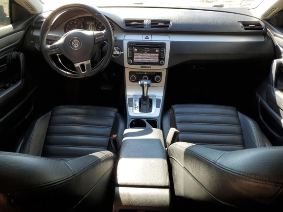 2011 Volkswagen CC Sport with VIN WVWMP7ANXBE712067, listed as a Copart auction lot 48621425 with 116,938 mi miles and Salvage Title. Bid and sale history available at carsss.com. Image 8.