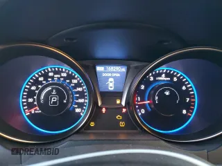 2013 Hyundai Genesis Coupe Track z VIN KMHHU6KJ1DU095159, wystawiony jako Copart lot #88560805 z przebiegiem 168 290 mil mil oraz Szkoda całkowita • Salvage title. Historia ofert i sprzedaży dostępna na DreamBid. Obrazek 9.