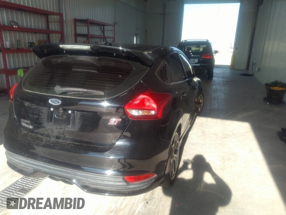 2017 Ford Focus ST with VIN 1FADP3L9XHL229696, listed as a IAAI auction lot 33863952 with 66,132 mi miles and . Bid and sale history available at carsss.com. Image 4.