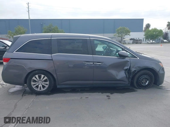 2016 Honda Odyssey EX-L with VIN 5FNRL5H68GB104350, listed as a IAAI auction lot 42023306 with 124,672 mi miles. Bid and sale history available at carsss.com. Image 14.