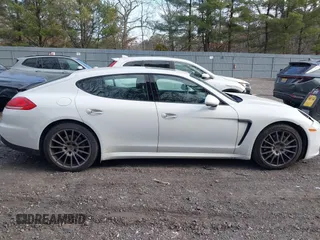 2016 Porsche Panamera 4 z VIN WP0AA2A78GL002029, wystawiony jako IAAI lot #41644555 z przebiegiem 54 915 mil mil oraz . Historia ofert i sprzedaży dostępna na DreamBid. Obrazek 13.