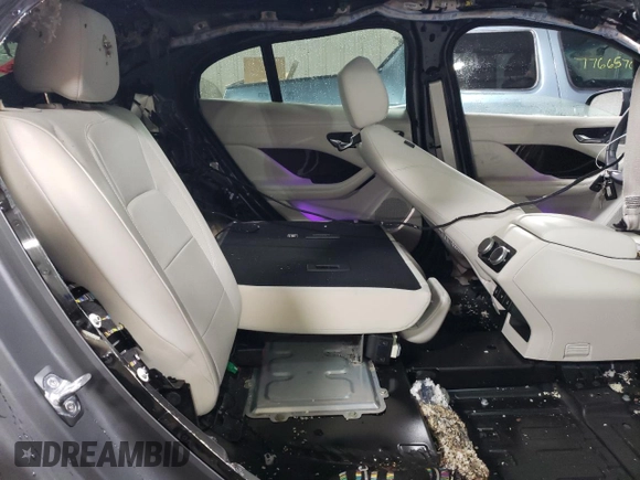2019 Jaguar I-Pace HSE z VIN SADHD2S10K1F71324, wystawiony jako Copart lot #77226904 z przebiegiem 15 864 mil mil oraz Szkoda całkowita • Salvage title. Historia ofert i sprzedaży dostępna na DreamBid. Obrazek 10.