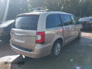 2015 Chrysler Town & Country Limited Platinum with VIN 2C4RC1GGXFR619209, listed as a IAAI auction lot 40366234 with 163,649 mi miles. Bid and sale history available at carsss.com. Image 4.