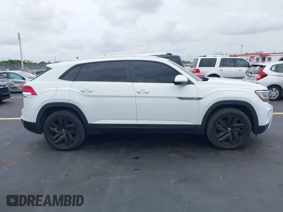 2023 Volkswagen Atlas SE with VIN 1V2JE2CA3PC227230, listed as a IAAI auction lot 42435466 with 86,217 mi miles and . Bid and sale history available at DreamBid. Image 13.