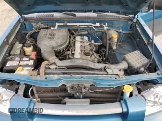 2002 Nissan Frontier XE with VIN 1N6DD26S22C362856, listed as a Copart auction lot 82979184 with 166,432 mi miles and Salvage title. Bid and sale history available at DreamBid. Image 11.