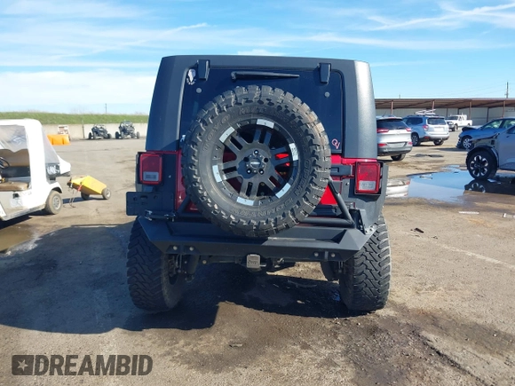 2007 Jeep Wrangler Unlimited X with VIN 1J4GA39147L157588, listed as a IAAI auction lot 41637089 with 87,812 mi miles and . Bid and sale history available at DreamBid. Image 16.