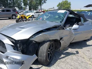 2021 Ford Mustang EcoBoost z VIN 1FATP8UH2M5120162, wystawiony jako IAAI lot #42561125 z przebiegiem 55 360 mil mil oraz . Historia ofert i sprzedaży dostępna na DreamBid. Obrazek 6.