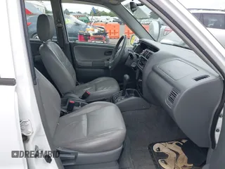 2001 Chevrolet Tracker LT with VIN 2CNBE634716940361, listed as a IAAI auction lot 42518865 with 142,369 mi miles and . Bid and sale history available at DreamBid. Image 5.