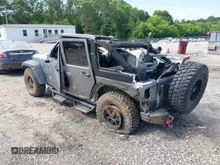 2017 Jeep Wrangler Unlimited Sport with VIN 1C4HJWDG6HL592265, listed as a IAAI auction lot 42335663 with 89,314 mi miles and . Bid and sale history available at DreamBid. Image 3.