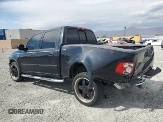 2003 Ford F-150 XLT with VIN 1FTRW07L33KB17103, listed as a Copart auction lot 49471045 with 194,367 mi miles and Salvage Title. Bid and sale history available at carsss.com. Image 2.