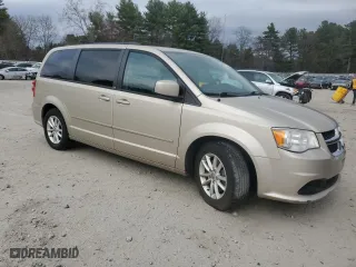 2014 Dodge Grand Caravan SXT 30th Anniversary with VIN 2C4RDGCG8ER182671, listed as a Copart auction lot 54088225 with 130,002 mi miles and Clean Title. Bid and sale history available at carsss.com. Image 4.