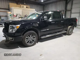 2017 Nissan Titan XD SL with VIN 1N6BA1F48HN561757, listed as a Copart auction lot 87204594 with 100,339 mi miles and Salvage Title. Bid and sale history available at carsss.com. Image 1.