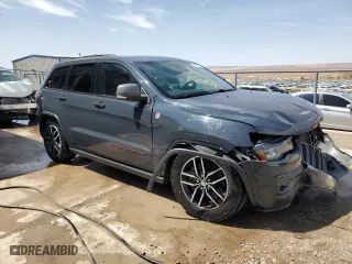 2018 Jeep Grand Cherokee Trailhawk with VIN 1C4RJFLT6JC328715, listed as a Copart auction lot 49987175 with 105,515 mi miles and Salvage Title. Bid and sale history available at carsss.com. Image 4.