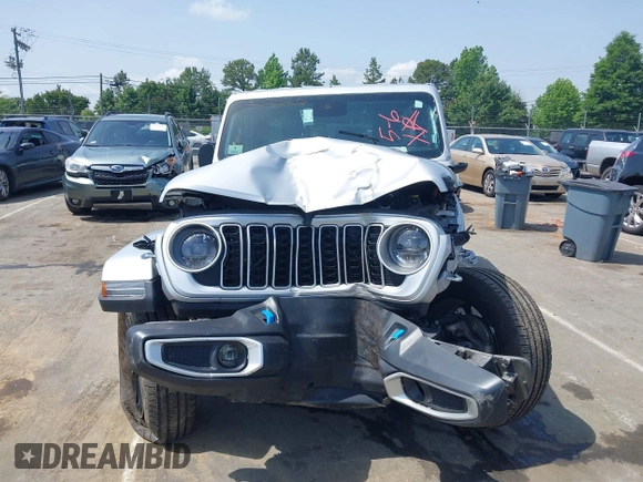 2024 Jeep Wrangler Sahara with VIN 1C4RJXP60RW292136, listed as a IAAI auction lot 42280063 with 26,701 mi miles and . Bid and sale history available at DreamBid. Image 12.
