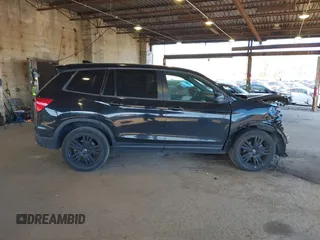 2021 Honda Passport Sport with VIN 5FNYF8H27MB021098, listed as a IAAI auction lot 41333241 with 101,239 mi miles and . Bid and sale history available at DreamBid. Image 13.