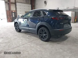 2024 Mazda CX-30 S Select Sport z VIN 3MVDMBBM2RM707143, wystawiony jako IAAI lot #42267284 z przebiegiem 6 133 mil mil oraz . Historia ofert i sprzedaży dostępna na DreamBid. Obrazek 3.