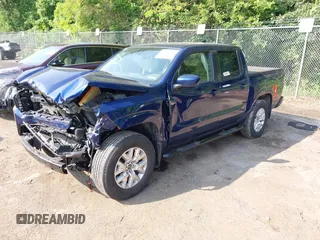 2022 Nissan Frontier SV z VIN 1N6ED1EJ2NN602942, wystawiony jako IAAI lot #42471186 z przebiegiem 41 858 mil mil oraz . Historia ofert i sprzedaży dostępna na DreamBid. Obrazek 2.
