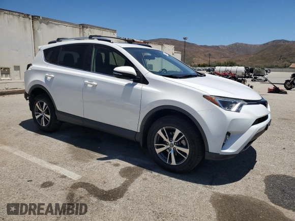 2018 Toyota RAV4 XLE with VIN JTMWFREV1JD122524, listed as a Copart auction lot 63707745 with 51,003 mi miles and Salvage title. Bid and sale history available at DreamBid. Image 4.