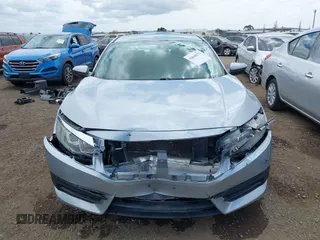 2018 Honda Civic LX with VIN 2HGFC2F50JH500559, listed as a IAAI auction lot 42040271 with 82,026 mi miles and . Bid and sale history available at DreamBid. Image 6.